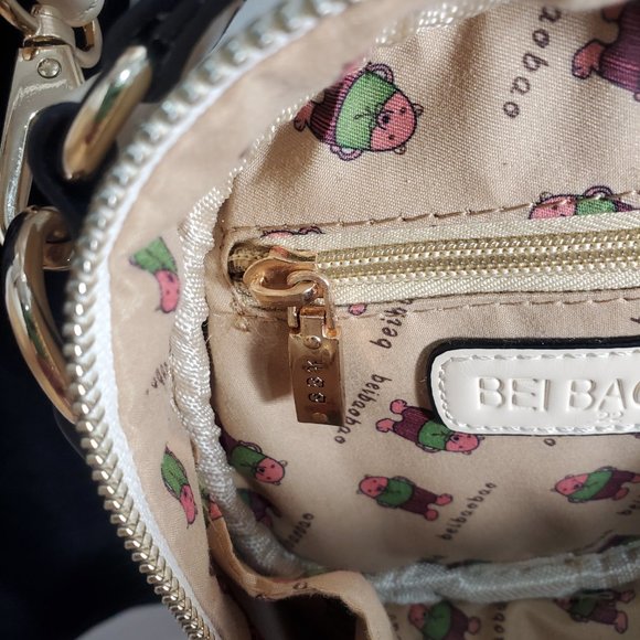 Bei Bao Bao Ivory Faux Leather Circular Round Cross-Body bag with Gold Hardware - Picture 10 of 14